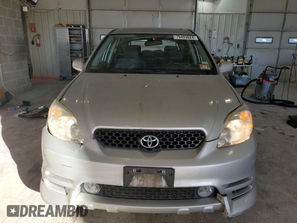 2003 Toyota Matrix Std with VIN 2T1KR32EX3C024230, listed as a Copart auction lot 79403624 with 182,110 mi miles and Salvage Title. Bid and sale history available at DreamBid. Image 5.