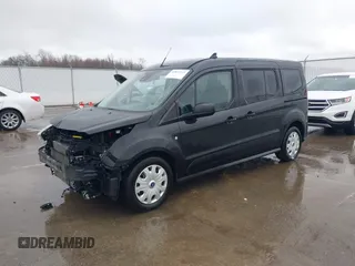 2019 Ford Transit Connect XLT z VIN NM0GE9F22K1427591, wystawiony jako IAAI lot #41833323 z przebiegiem 67 267 mil mil oraz . Historia ofert i sprzedaży dostępna na DreamBid. Obrazek 18.
