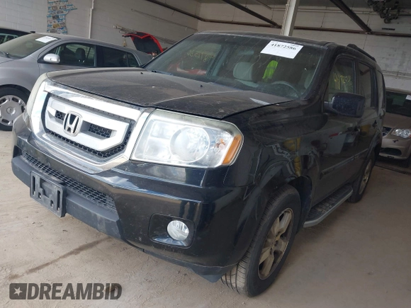 2011 Honda Pilot EX with VIN 5FNYF4H45BB093652, listed as a IAAI auction lot 41872586 with 213,125 mi miles. Bid and sale history available at carsss.com. Image 2.