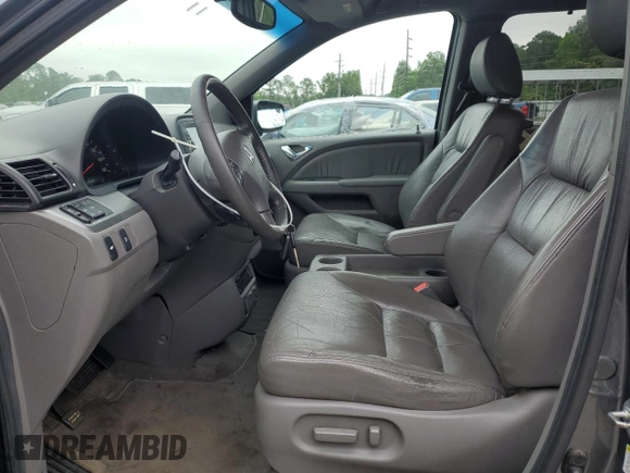 2010 Honda Odyssey EX-L z VIN 5FNRL3H71AB044612, wystawiony jako Copart lot #55473365 z przebiegiem 181 193 mil mil oraz Szkoda całkowita • Salvage title. Historia ofert i sprzedaży dostępna na DreamBid. Obrazek 7.