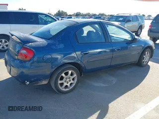 2003 Dodge Neon SXT with VIN 1B3ES56C43D150870, listed as a IAAI auction lot 41478965 with 219,292 mi miles. Bid and sale history available at carsss.com. Image 4.