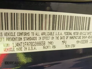 2011 Jeep Compass with VIN 1J4NT1FA7BD208658, listed as a IAAI auction lot 41795085 with 198,880 mi miles. Bid and sale history available at carsss.com. Image 9.