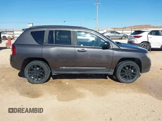 2014 Jeep Compass Sport with VIN 1C4NJCBA4ED880940, listed as a IAAI auction lot 41712357 with 156,171 mi miles. Bid and sale history available at carsss.com. Image 13.