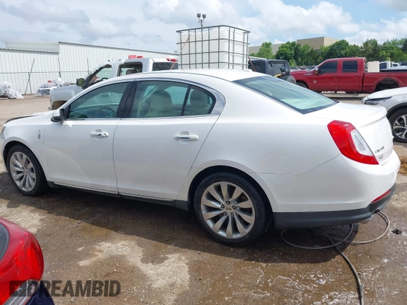 2014 Lincoln MKS z VIN 1LNHL9DK7EG601720, wystawiony jako IAAI lot #42464979 z przebiegiem 58 163 mil mil oraz . Historia ofert i sprzedaży dostępna na DreamBid. Obrazek 14.