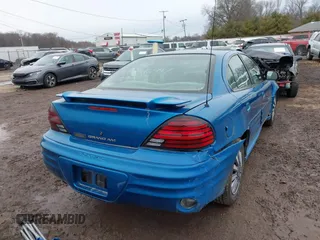 1999 Pontiac Grand Am SE2 with VIN 1G2NE52T2XM904094, listed as a IAAI auction lot 41746997 with 0 mi miles. Bid and sale history available at carsss.com. Image 4.