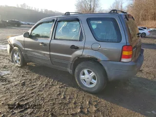 2004 Ford Escape XLS with VIN 1FMCU92134KB88319, listed as a Copart auction lot 84243494 with 158,052 mi miles and Salvage Title. Bid and sale history available at DreamBid. Image 2.