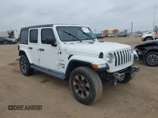 2018 Jeep Wrangler Unlimited Sahara with VIN 1C4HJXEG3JW207429, listed as a IAAI auction lot 41509257 with 121,596 mi miles. Bid and sale history available at carsss.com. Image 1.