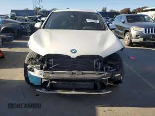 2021 BMW X1 xDrive28i with VIN WBXJG9C09M5S71263, listed as a Copart auction lot 46374565 with 61,537 mi miles and Salvage Title. Bid and sale history available at carsss.com. Image 5.