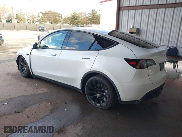 2023 Tesla Model Y Long Range with VIN 7SAYGAEE0PF787216, listed as a IAAI auction lot 41589954 with 17,985 mi miles and . Bid and sale history available at DreamBid. Image 3.