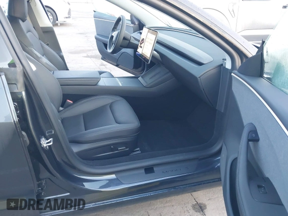2025 Tesla Model 3 Long Range with VIN 5YJ3E1EA1SF877851, listed as a IAAI auction lot 41917772 with 2,313 mi miles and . Bid and sale history available at carsss.com. Image 5.