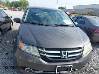 2014 Honda Odyssey Touring with VIN 5FNRL5H99EB111685, listed as a IAAI auction lot 42141227 with 183,484 mi miles and . Bid and sale history available at DreamBid. Image 12.