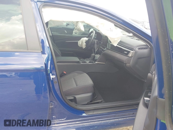 2025 Toyota Camry LE with VIN 4T1DAACK0SU091506, listed as a IAAI auction lot 41880460 with 8,407 mi miles and . Bid and sale history available at DreamBid. Image 5.