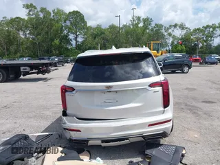 2020 Cadillac XT6 FWD Premium Luxury with VIN 1GYKPCRS6LZ193579, listed as a IAAI auction lot 42367917 with 39,647 mi miles and . Bid and sale history available at DreamBid. Image 17.
