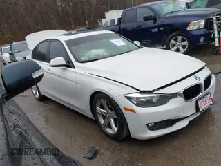 2014 BMW 3 Series 328i xDrive with VIN WBA3B5C56EF599323, listed as a IAAI auction lot 41853533 with 114,358 mi miles. Bid and sale history available at carsss.com. Image 1.