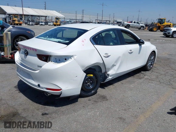 2024 Mazda 3 S Preferred with VIN 3MZBPACMXRM420901, listed as a IAAI auction lot 42101021 with 6,443 mi miles and . Bid and sale history available at DreamBid. Image 4.