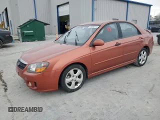 2009 Kia Spectra SX with VIN KNAFE221095026589, listed as a Copart auction lot 45005514 with 203,779 mi miles and Salvage Title. Bid and sale history available at carsss.com. Image 1.