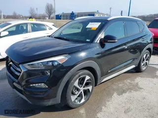 2017 Hyundai Tucson Value with VIN KM8J33A25HU586191, listed as a IAAI auction lot 41682127 with 58,877 mi miles. Bid and sale history available at carsss.com. Image 18.