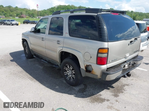 2005 Chevrolet Tahoe LT z VIN 1GNEK13T35R196103, wystawiony jako IAAI lot #42053184 z przebiegiem 326 536 mil mil oraz . Historia ofert i sprzedaży dostępna na DreamBid. Obrazek 3.