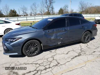 2019 Toyota Avalon Limited Hybrid z VIN 4T1B21FB8KU003673, wystawiony jako Copart lot #49881235 z przebiegiem 100 177 mil mil oraz Szkoda całkowita • Salvage title. Historia ofert i sprzedaży dostępna na DreamBid. Obrazek 1.