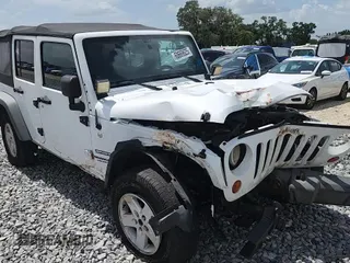 2012 Jeep Wrangler Unlimited Sport with VIN 1C4BJWDG6CL240673, listed as a Copart auction lot 60669625 with Not provided miles and Salvage title. Bid and sale history available at DreamBid. Image 14.