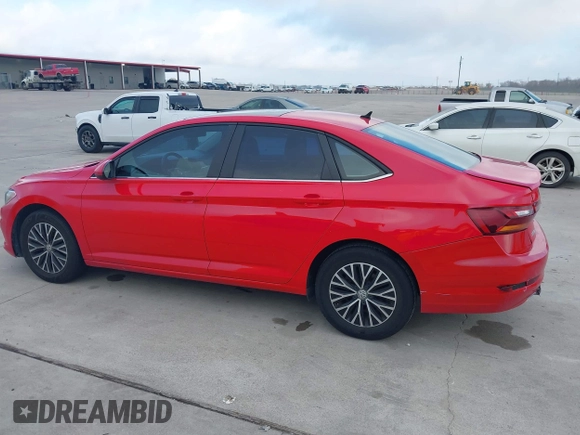 2019 Volkswagen Jetta S z VIN 3VWC57BUXKM099060, wystawiony jako IAAI lot #41478697 z przebiegiem 134 363 mil mil oraz . Historia ofert i sprzedaży dostępna na DreamBid. Obrazek 13.