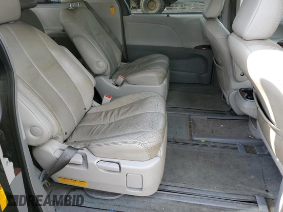2014 Toyota Sienna Limited z VIN 5TDDK3DC5ES086024, wystawiony jako Copart lot #56299555 z przebiegiem 136 876 mil mil oraz Szkoda całkowita • Salvage title. Historia ofert i sprzedaży dostępna na DreamBid. Obrazek 11.