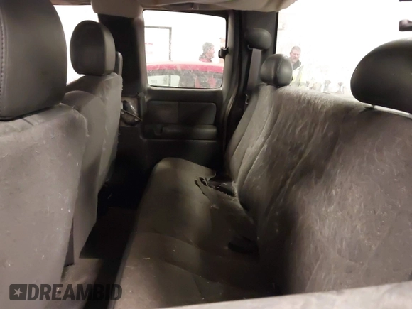 2004 Chevrolet Silverado 1500 with VIN 1GCEK19T74E385021, listed as a IAAI auction lot 41352639 with 152,734 mi miles and . Bid and sale history available at DreamBid. Image 8.