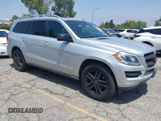 2014 Mercedes-Benz GL 450 z VIN 4JGDF7CE9EA411572, wystawiony jako IAAI lot #42461631 z przebiegiem 121 885 mil mil oraz . Historia ofert i sprzedaży dostępna na DreamBid. Obrazek 1.