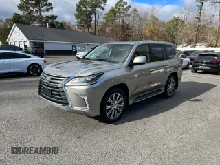 2016 Lexus LX 570 with VIN JTJHY7AX7G4203810, listed as a Copart auction lot 80800914 with 296,703 mi miles and Clean Title. Bid and sale history available at DreamBid. Image 2.