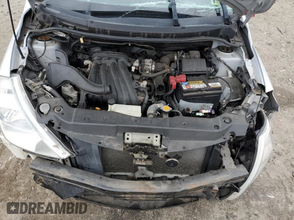 2009 Nissan Versa 1.6 z VIN 3N1CC11E49L492412, wystawiony jako Copart lot #47807175 z przebiegiem Nie podano mil oraz Szkoda całkowita • Salvage title. Historia ofert i sprzedaży dostępna na DreamBid. Obrazek 11.
