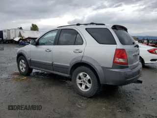 2003 Kia Sorento LX z VIN KNDJC733335030322, wystawiony jako Copart lot #77607974 z przebiegiem 109 777 mil mil oraz Szkoda całkowita • Salvage title. Historia ofert i sprzedaży dostępna na DreamBid. Obrazek 2.