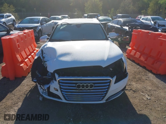 2013 Audi A8 4.0L with VIN WAUA2AFD9DN017867, listed as a IAAI auction lot 40430651 with 114,928 mi miles and . Bid and sale history available at DreamBid. Image 12.