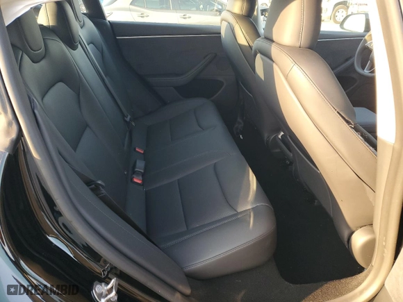 2024 Tesla Model 3 Long Range with VIN 5YJ3E1EB1RF799493, listed as a Copart auction lot 42561895 with 1,267 mi miles and Salvage Title. Bid and sale history available at carsss.com. Image 11.