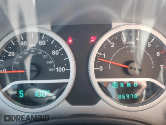2009 Jeep Wrangler Sahara with VIN 1J4FA54119L747068, listed as a Copart auction lot 71209904 with 86,978 mi miles and Salvage title. Bid and sale history available at DreamBid. Image 9.