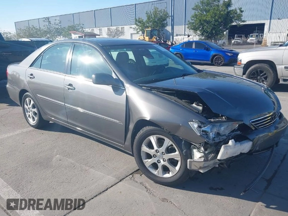 2005 Toyota Camry LE with VIN 4T1BF30K55U619313, listed as a IAAI auction lot 41854001 with 89,982 mi miles and . Bid and sale history available at DreamBid. Image 1.