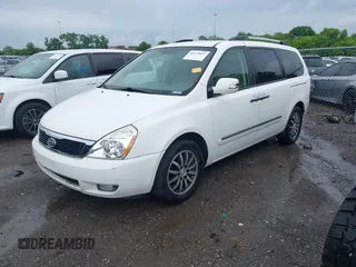 2012 Kia Sedona EX with VIN KNDMH4C76C6457908, listed as a IAAI auction lot 42179927 with 196,104 mi miles and . Bid and sale history available at DreamBid. Image 2.