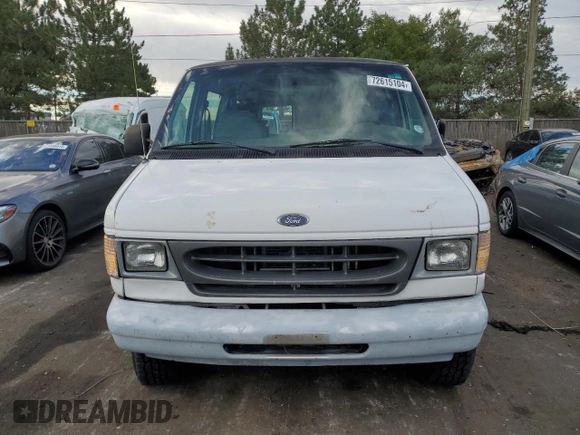 1999 Ford Econoline Passenger XL with VIN 1FBSS31L2XHA95612, listed as a Copart auction lot 72615104 with 211,283 mi miles and Salvage Title. Bid and sale history available at DreamBid. Image 5.