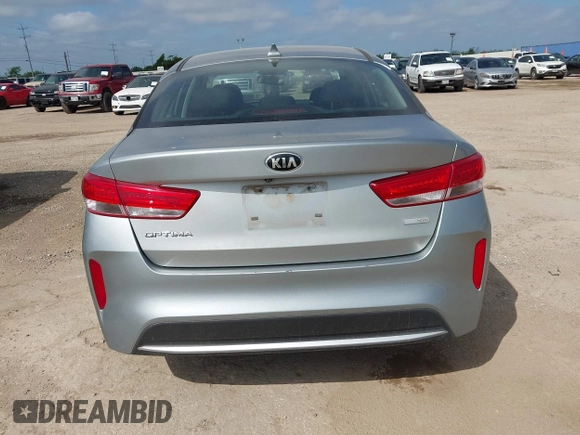 2017 Kia Optima with VIN KNAGT4LE6H5009057, listed as a IAAI auction lot 42521270 with 129,853 mi miles and . Bid and sale history available at DreamBid. Image 16.