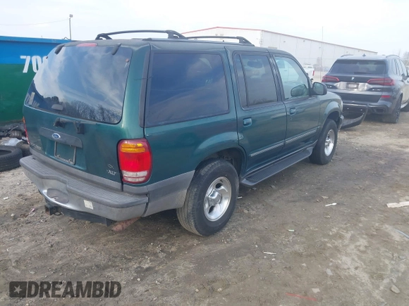 1999 Ford Explorer XLT z VIN 1FMZU32E7XZB57306, wystawiony jako IAAI lot #41519800 z przebiegiem 226 932 mil mil oraz . Historia ofert i sprzedaży dostępna na DreamBid. Obrazek 4.