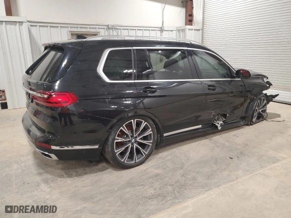2019 BMW X7 xDrive50i with VIN 5UXCX4C54KLS39168, listed as a Copart auction lot 87574115 with 0 mi miles and Salvage Title. Bid and sale history available at carsss.com. Image 3.