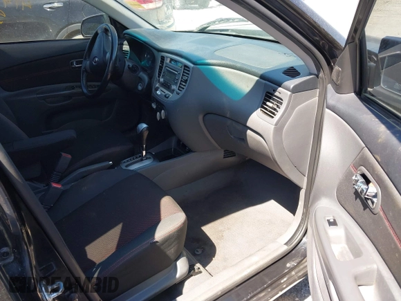2008 Kia Rio LX with VIN KNADE123X86323641, listed as a IAAI auction lot 41985631 with 175,102 mi miles and . Bid and sale history available at DreamBid. Image 5.