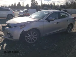 2015 Mazda 3 S Touring with VIN JM1BM1V32F1227683, listed as a Copart auction lot 43557945 with 121,981 mi miles and Salvage Title. Bid and sale history available at DreamBid. Image 1.