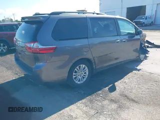 2016 Toyota Sienna XLE with VIN 5TDYK3DC7GS691618, listed as a IAAI auction lot 42496181 with 189,439 mi miles and . Bid and sale history available at DreamBid. Image 4.