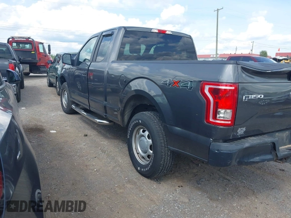 2015 Ford F-150 XLT with VIN 1FTEX1E89FKD84587, listed as a IAAI auction lot 42102545 with 141,265 mi miles. Bid and sale history available at carsss.com. Image 3.