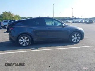 2024 Tesla Model Y Long Range z VIN 7SAYGDEEXRA263444, wystawiony jako IAAI lot #40199252 z przebiegiem 9 540 mil mil oraz . Historia ofert i sprzedaży dostępna na DreamBid. Obrazek 13.