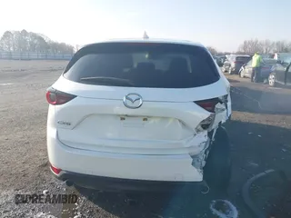 2019 Mazda CX-5 Touring z VIN JM3KFACM0K1564330, wystawiony jako IAAI lot #41797276 z przebiegiem 112 100 mil mil oraz . Historia ofert i sprzedaży dostępna na DreamBid. Obrazek 16.