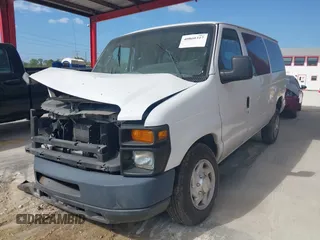 2014 Ford Econoline Passenger XL with VIN 1FBNE3BL5EDB11826, listed as a IAAI auction lot 40860317 with 216,900 mi miles. Bid and sale history available at carsss.com. Image 2.