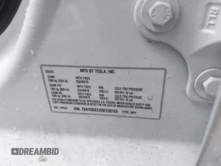 2024 Tesla Model Y Long Range z VIN 7SAYGDEEXRF230169, wystawiony jako IAAI lot #41723049 z przebiegiem Nie podano mil oraz . Historia ofert i sprzedaży dostępna na DreamBid. Obrazek 9.