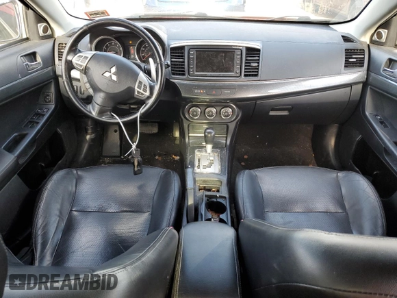 2011 Mitsubishi Lancer GTS with VIN JA32U8FW6BU011215, listed as a Copart auction lot 86357004 with 128,577 mi miles and Salvage Title. Bid and sale history available at carsss.com. Image 8.