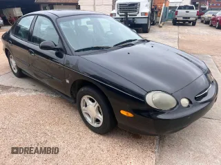 1999 Ford Taurus SE z VIN 1FAFP53SXXA145301, wystawiony jako Copart lot #60351535 z przebiegiem 57 262 mil mil oraz Czysty tytuł • Clean title. Historia ofert i sprzedaży dostępna na DreamBid. Obrazek 1.